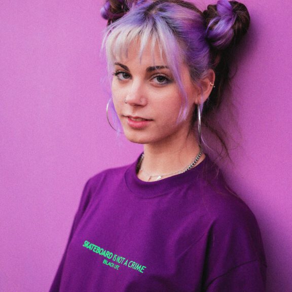 Bold and Vibrant: Expressive Streetwear Style with a Pop of Purple